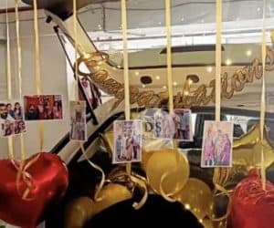 Elegant Congratulations Car Dikki Decoration in Delhi NCR with gold and red balloons, photo clips, and backdrop by Dream Spark Events