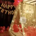 Cabana Birthday Decoration with fairy lights, red balloons, and canopy setup by Dream Spark Events in Delhi NCR