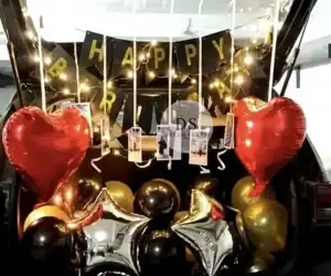 Car Boot Decoration in Delhi NCR with fairy lights, heart foil balloons, and personalized photos by Dream Spark Events