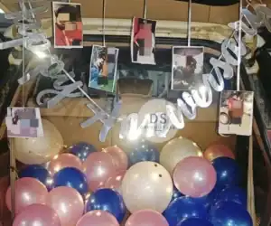 Car Boot Anniversary Decoration in Delhi NCR with fairy lights, balloons, and personalized photos by Dream Spark Events