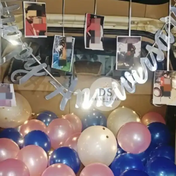 Car Boot Anniversary Decoration in Delhi NCR with fairy lights, balloons, and personalized photos by Dream Spark Events