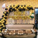 Roka Ceremony Decoration Package with gold and black balloons, silver shimmer backdrop, and metallic letter balloons by Dream Spark Events