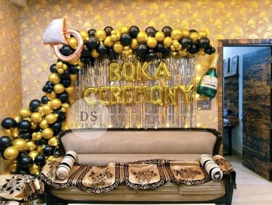 Roka Ceremony Decoration Package with gold and black balloons, silver shimmer backdrop, and metallic letter balloons by Dream Spark Events