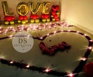 Love theme decoration Package with red and white balloons and fairy lights by Dream Spark Events