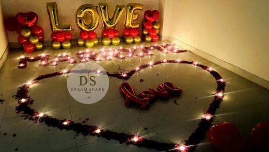 Love theme decoration Package with red and white balloons and fairy lights by Dream Spark Events
